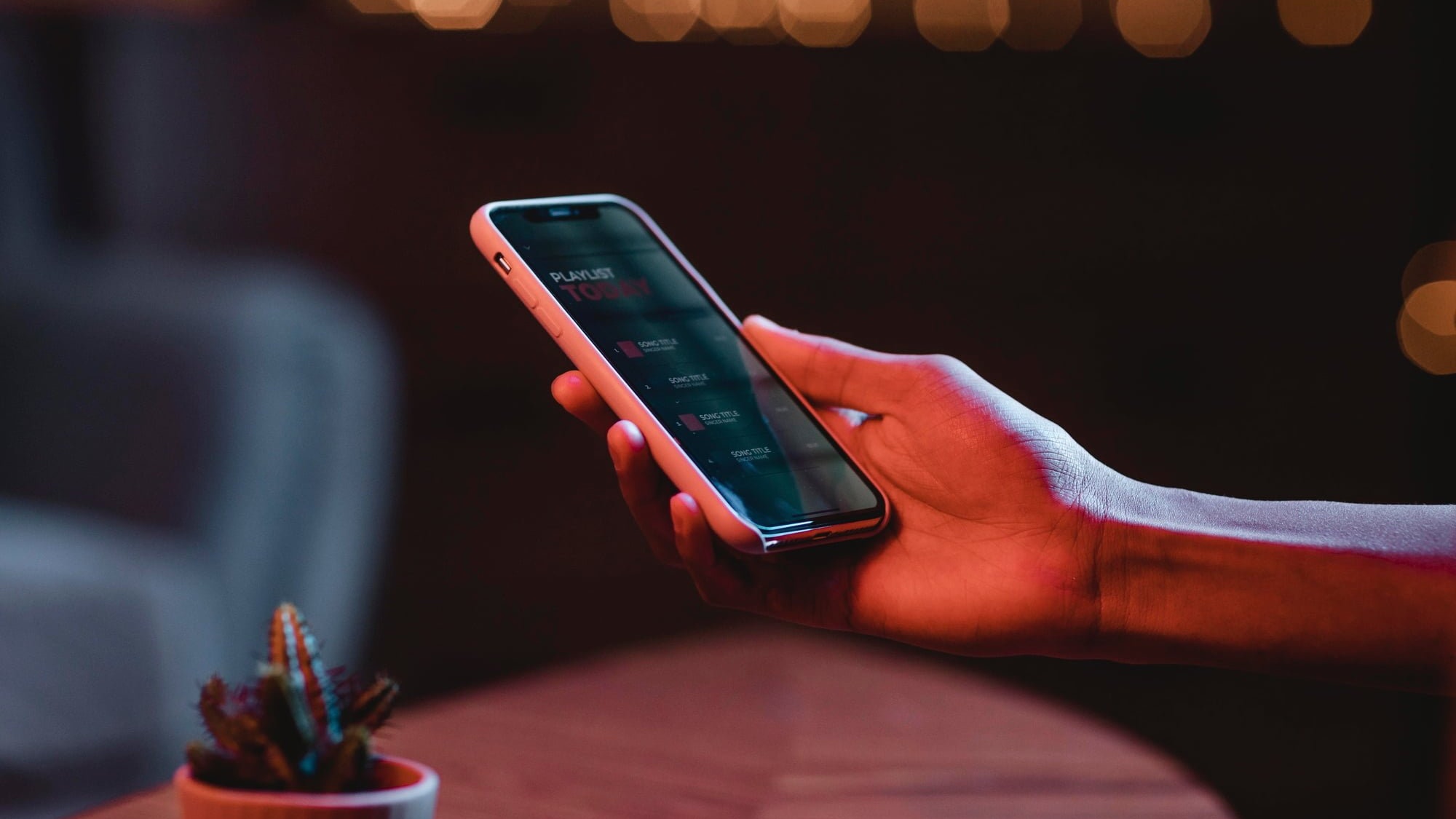 side view man holding smartphone hand